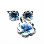 Set model floral din argint cu email albastru